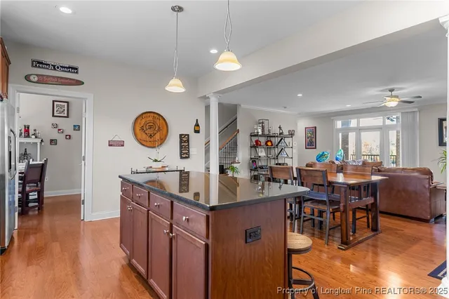 a living room with a fireplace and a flat screen tv