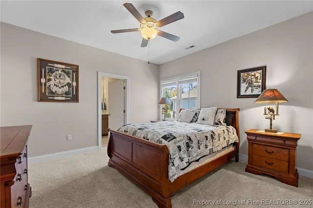 a view of a dining room with furniture a chandelier and wooden floor