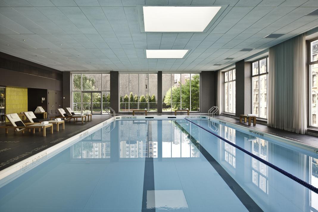 515 East 72nd Street, Unit 32C Manhattan, NY 10021 - Photo 13 of 15 a view of a living room and window