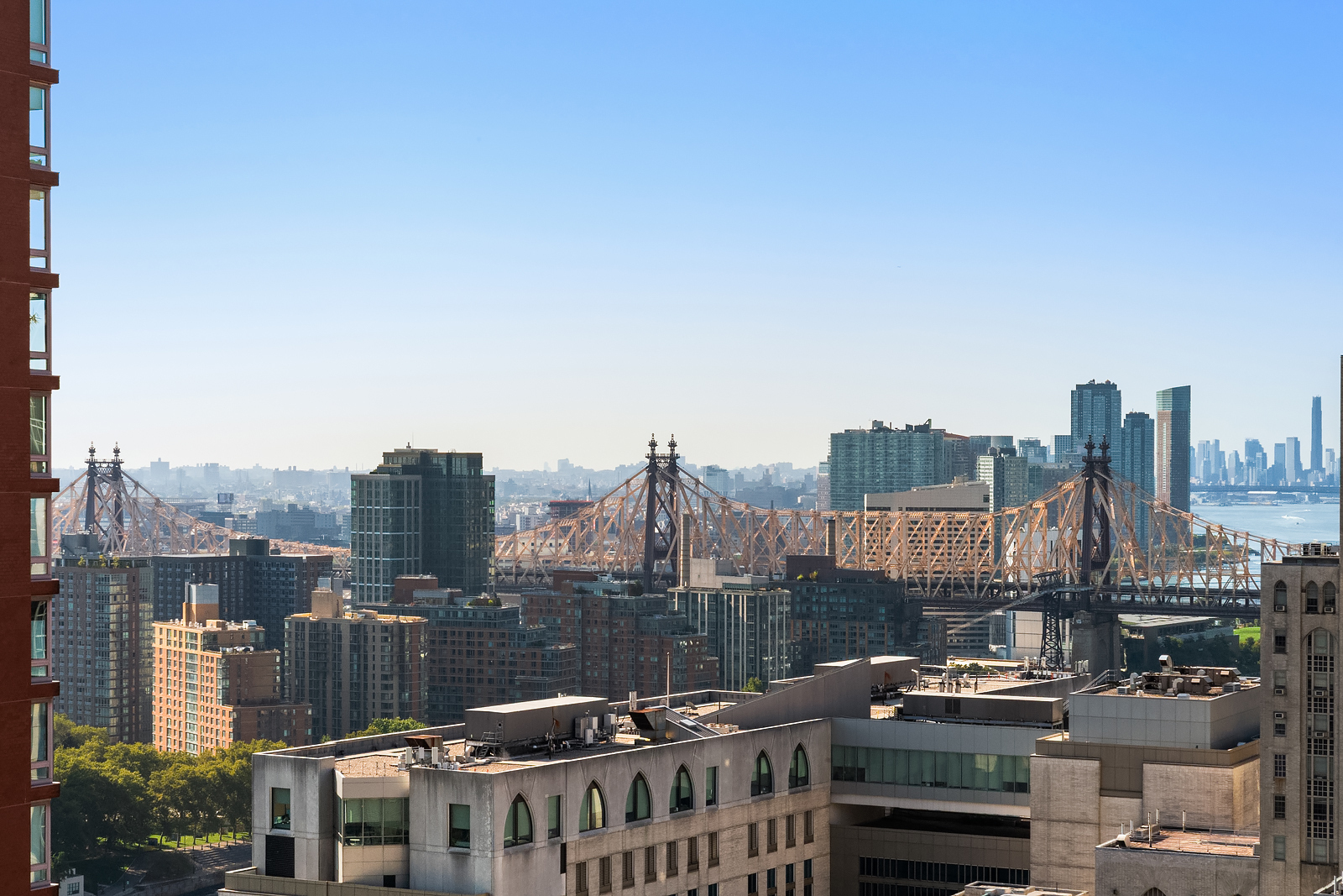 515 East 72nd Street, Unit 32C Manhattan, NY 10021 - Photo 9 of 15 a city view with tall buildings