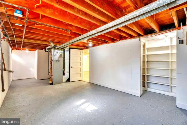 a view of a room with wooden walls