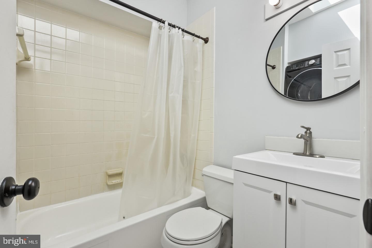 730 Light Street, Unit C Baltimore, MD 21230 - Photo 13 of 19 a bathroom with a sink toilet and shower
