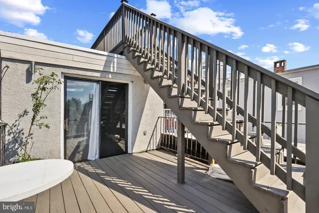 a view of entryway with wooden floor
