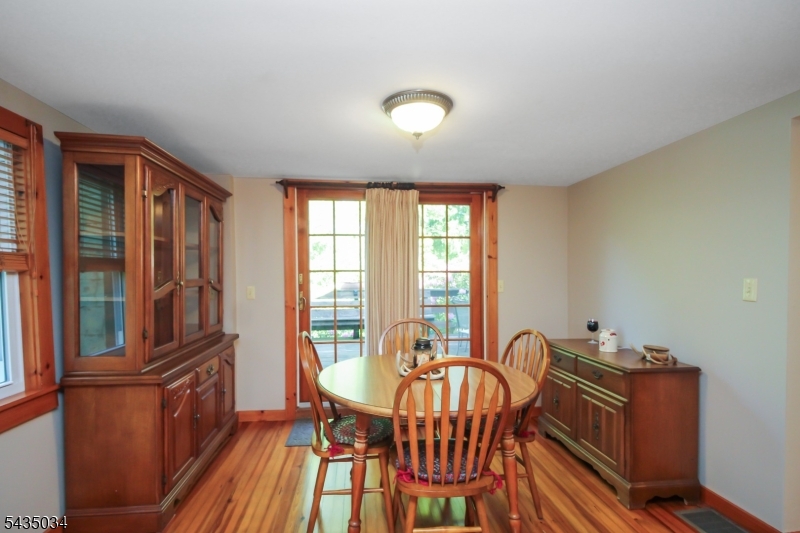 103 Petersburg Road Hackettstown, NJ 07840 - Photo 7 of 18 a view of a dining room with furniture window and wooden floor