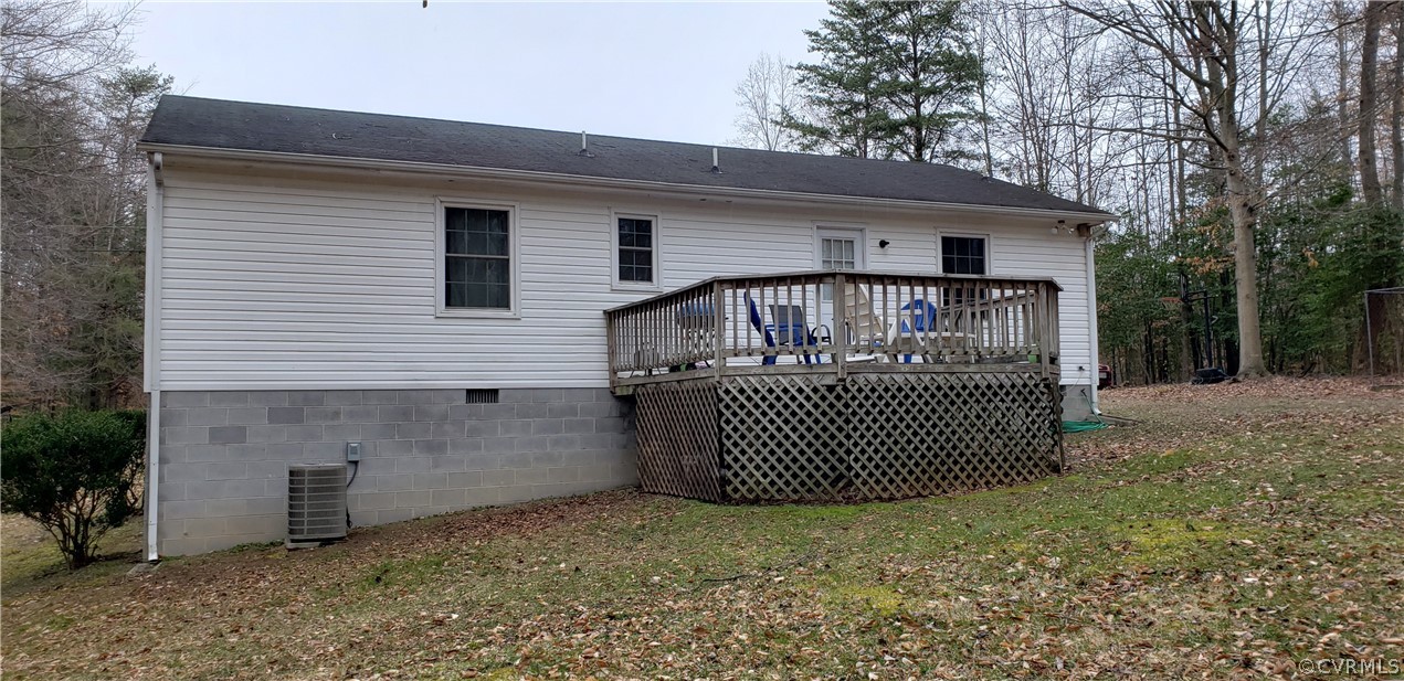 3963 Cedar Plains Road Sandy Hook, VA 23153 - Photo 12 of 12 a view of a house with a fence