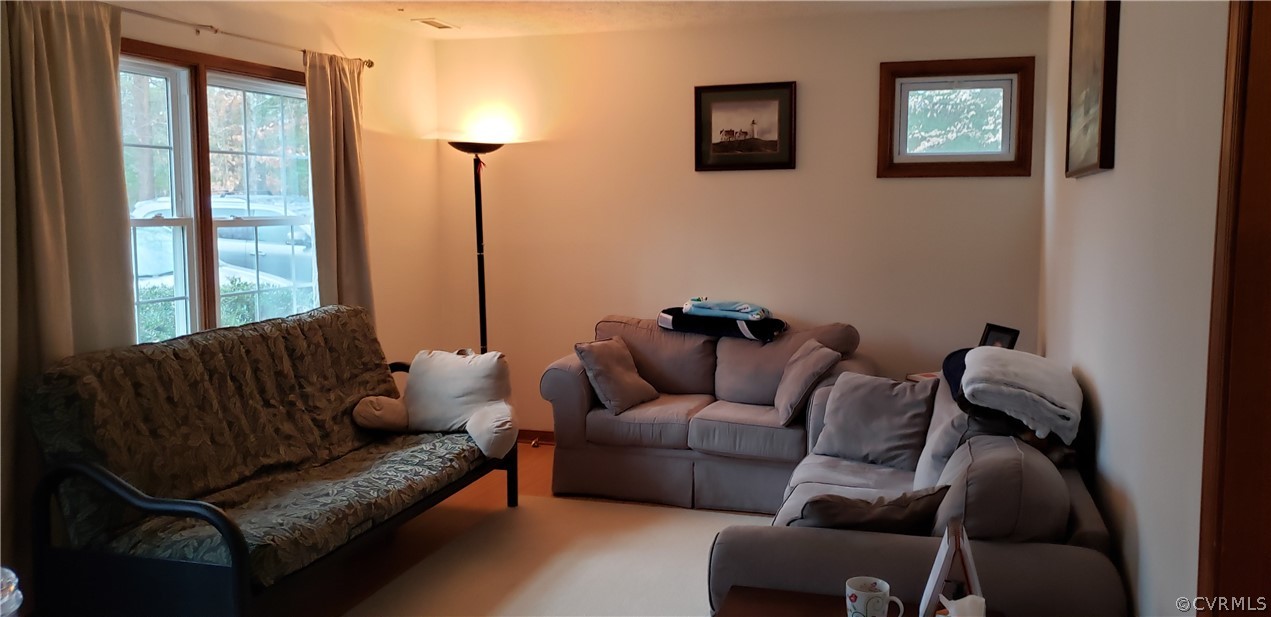3963 Cedar Plains Road Sandy Hook, VA 23153 - Photo 3 of 12 a living room with furniture and a window