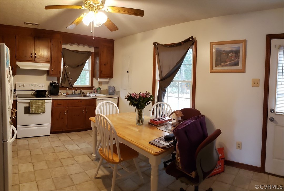 3963 Cedar Plains Road Sandy Hook, VA 23153 - Photo 4 of 12 a kitchen with a sink appliances and cabinets