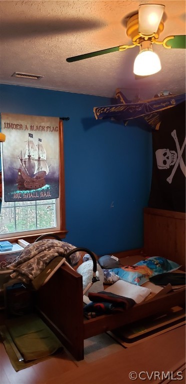3963 Cedar Plains Road Sandy Hook, VA 23153 - Photo 7 of 12 a bed sitting in a bedroom next to a window