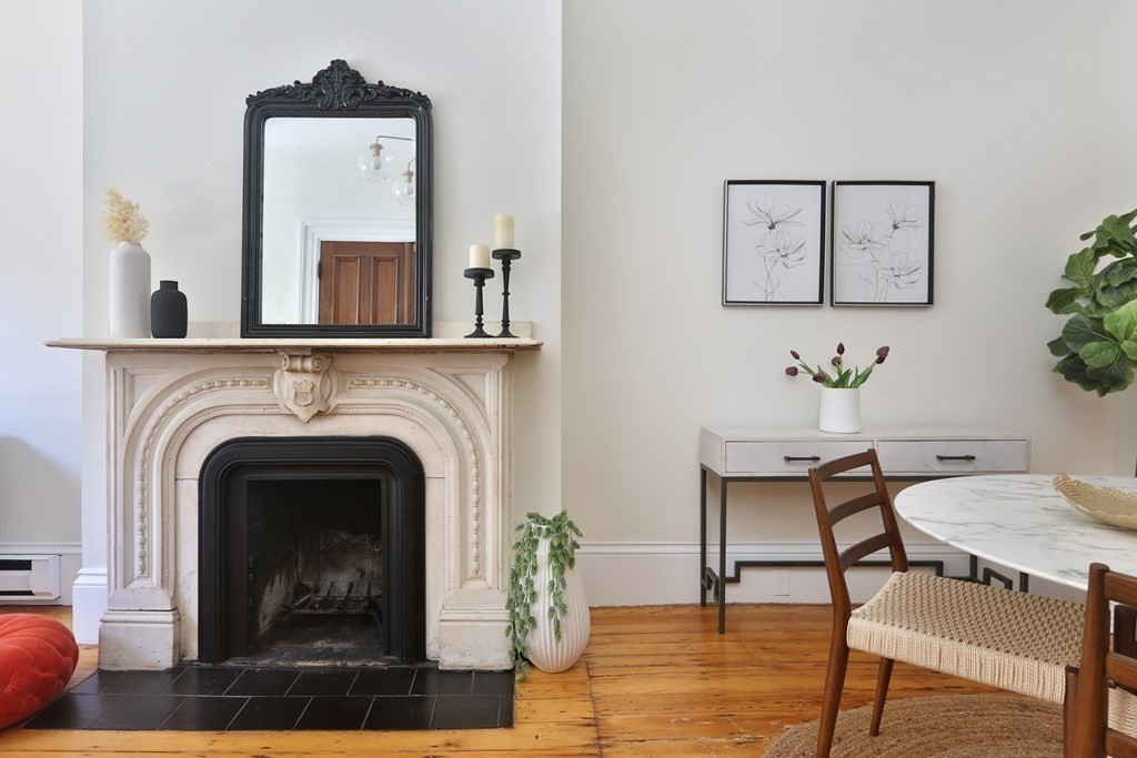 35 Milford Street, Unit 2 Boston, MA 02118 - Photo 3 of 12 a living room with furniture and a fireplace