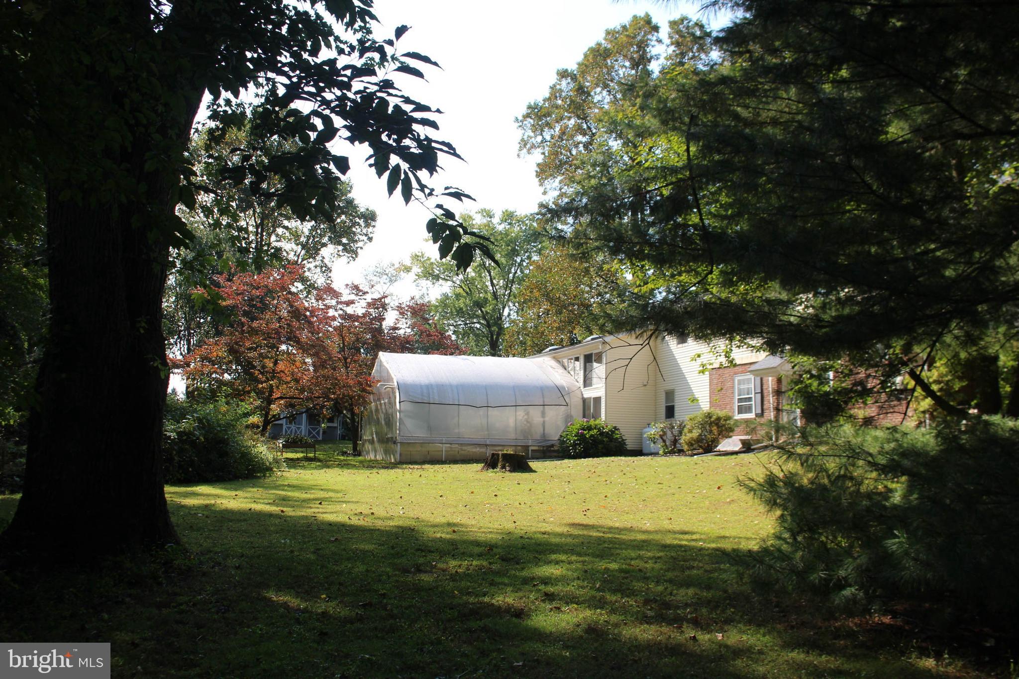 1046 Eagle Road Huntingdon Valley, PA 19006 - Photo 82 of 108 Greenhouse exterior