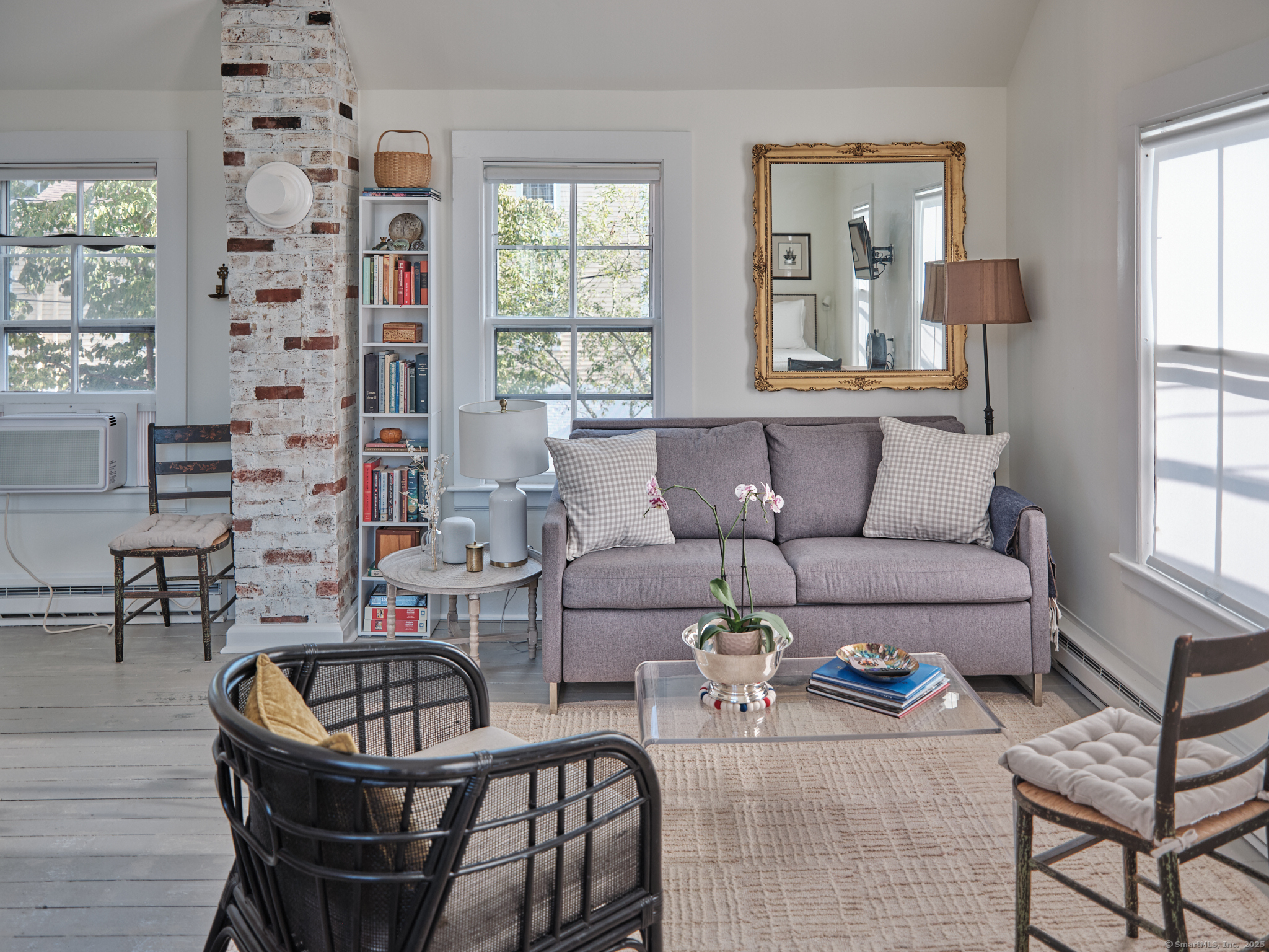 155 Water Street, Unit 2 Stonington, CT 06378 - Photo 5 of 14 a living room with furniture and a window