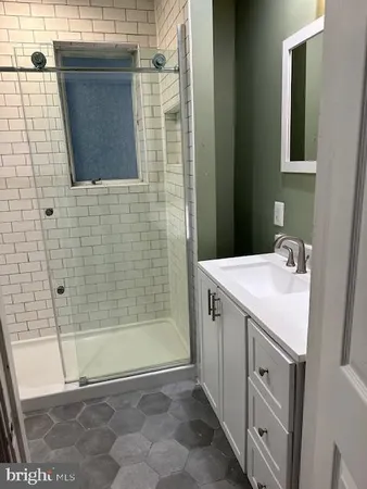 a bathroom with a sink and a bathtub