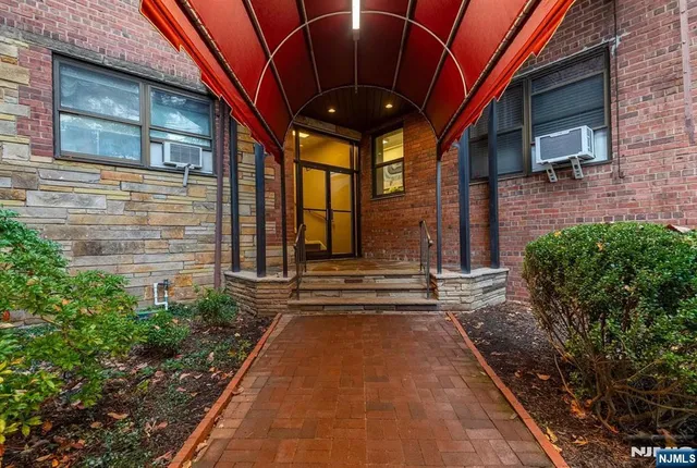 a view of a pathway with a backyard