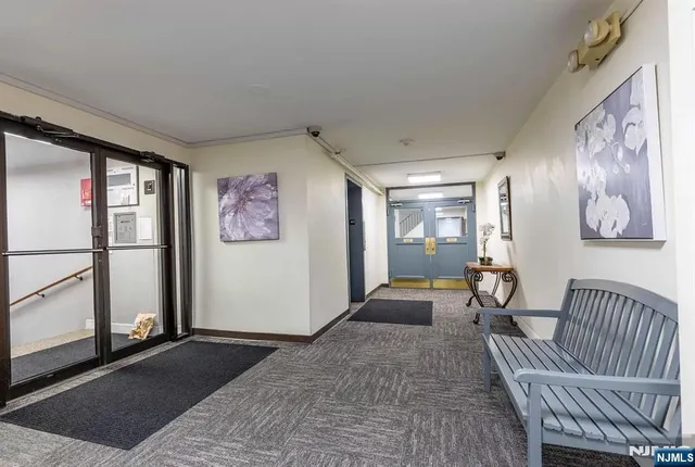 a view of a livingroom with furniture and window