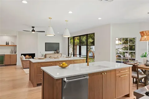 a kitchen with a stove and a sink