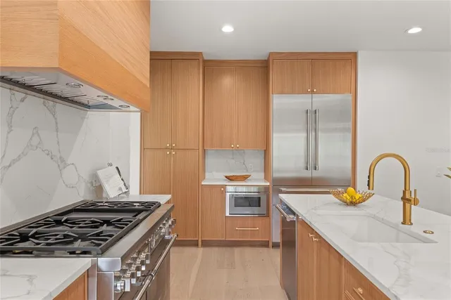 a living room with couch and a floor to ceiling window