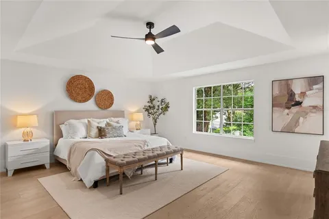 a view of swimming pool from a lounge chairs