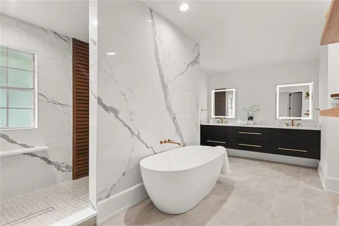 an aerial view of a houses with a yard