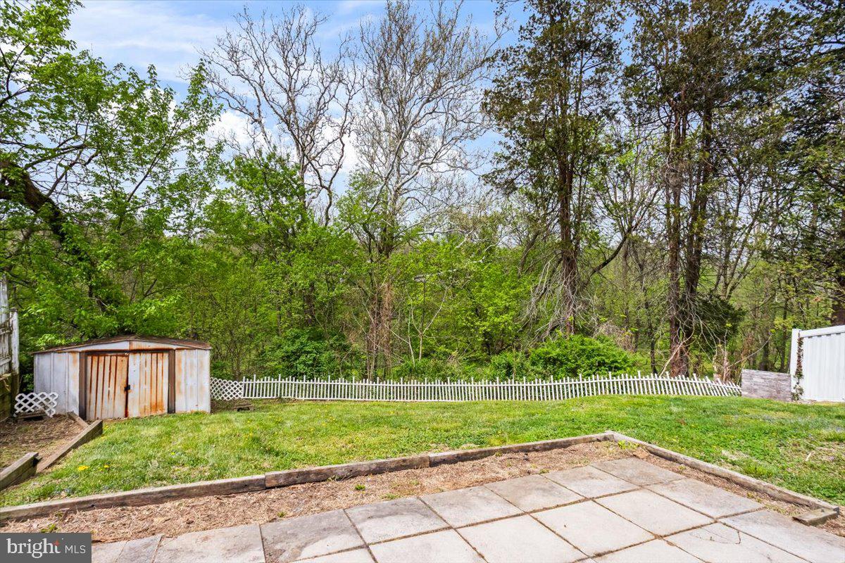 104 Lampeter Road Lancaster, PA 17602 - Photo 26 of 30 Serene backyard with lush greenery.