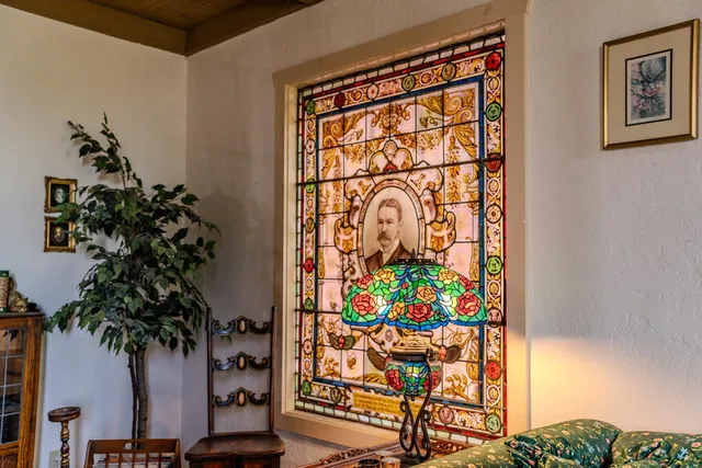 a bedroom with furniture and window