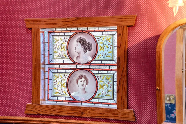 a view of a garden with large trees