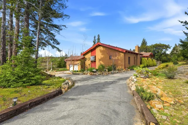 a view of front door with wooden floor