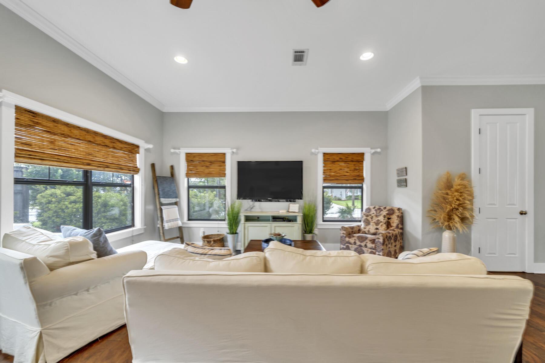 71 Emma Huggins Lane Santa Rosa Beach, FL 32459 - Photo 12 of 33 a living room with fireplace furniture and a large window