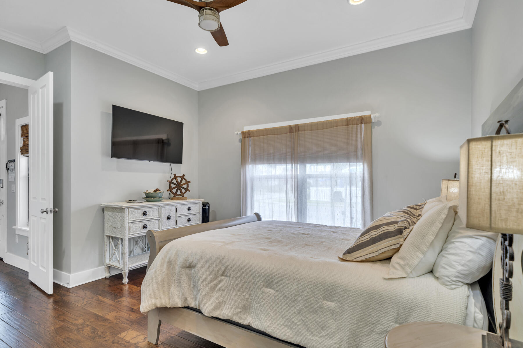 71 Emma Huggins Lane Santa Rosa Beach, FL 32459 - Photo 15 of 33 a bedroom with a bed and a flat screen tv
