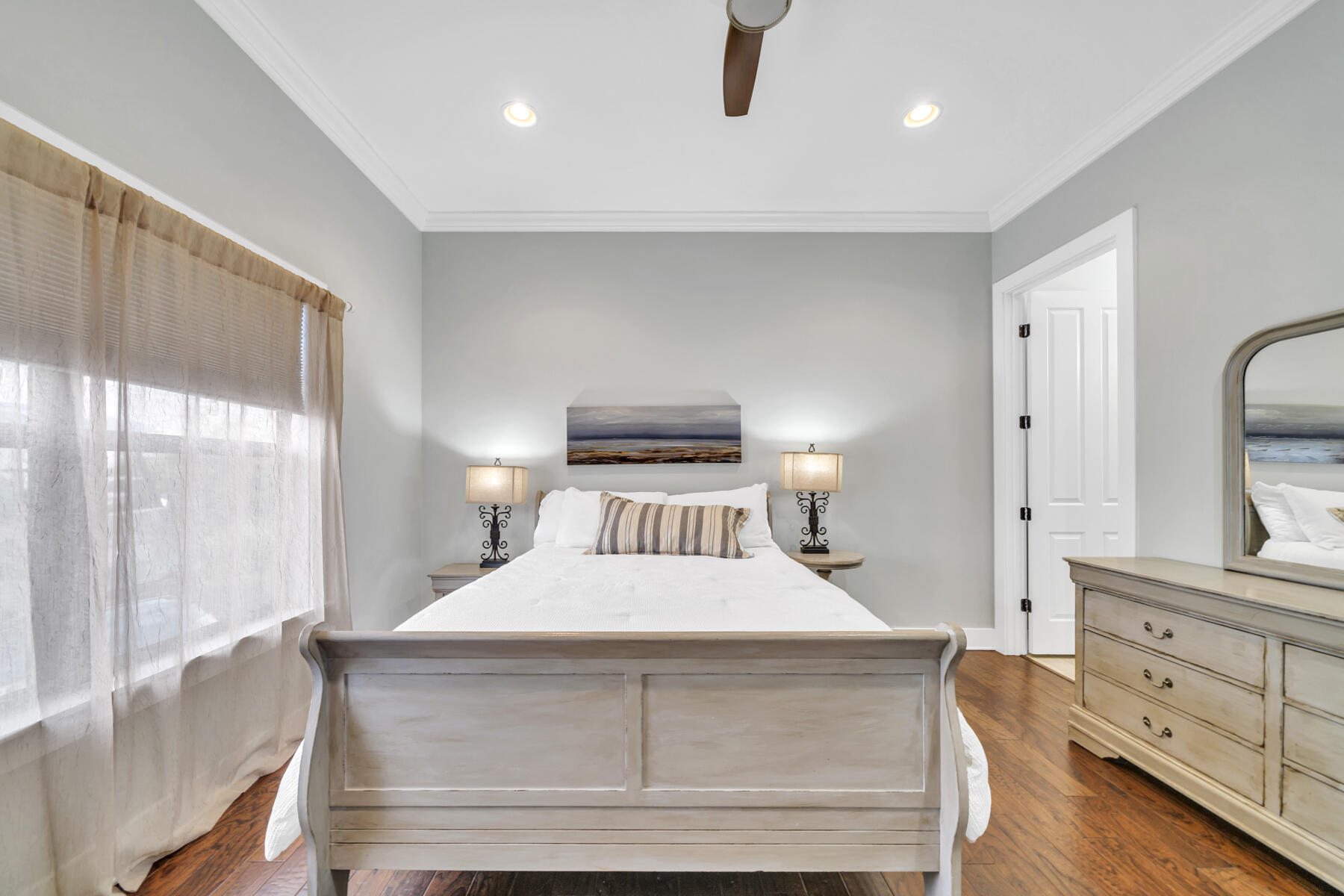 71 Emma Huggins Lane Santa Rosa Beach, FL 32459 - Photo 16 of 33 a bedroom with a large bed and a night stand