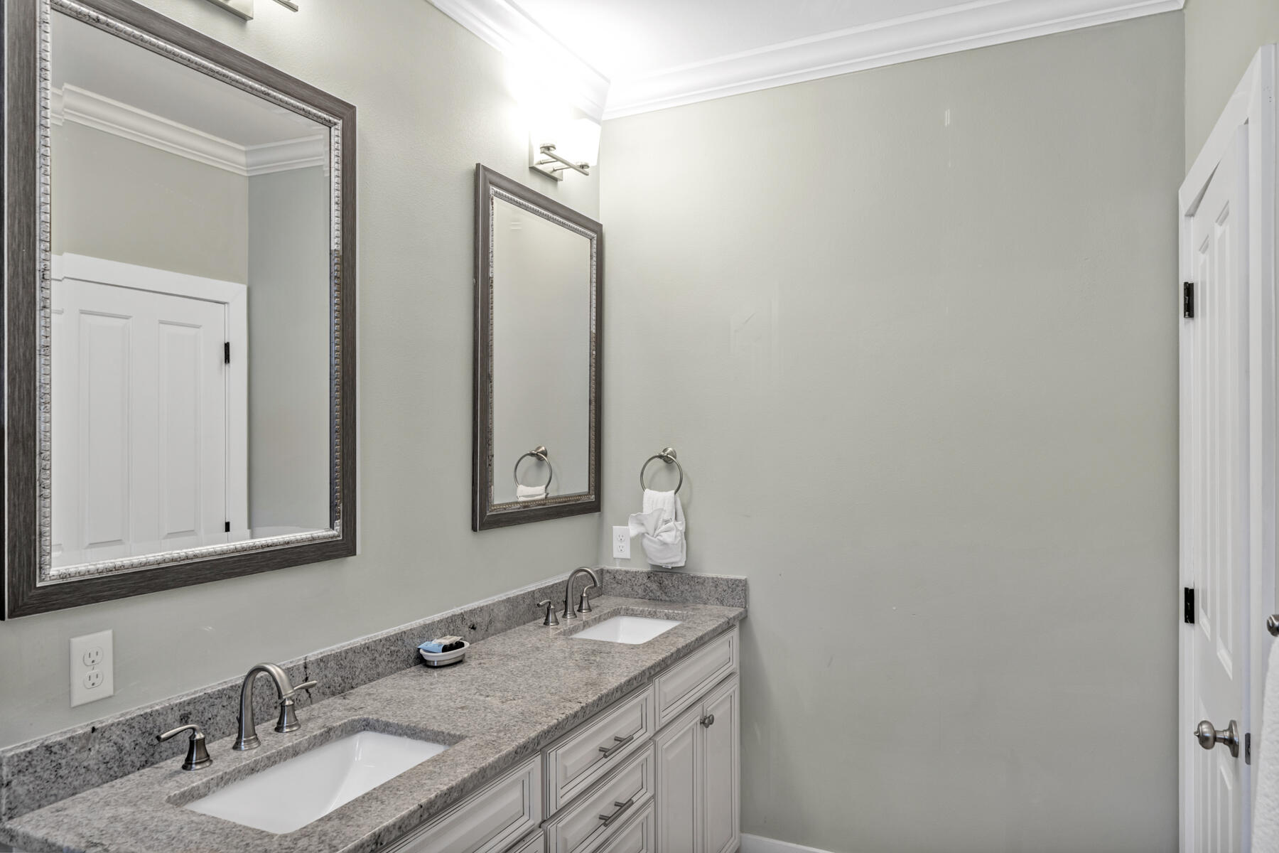 71 Emma Huggins Lane Santa Rosa Beach, FL 32459 - Photo 26 of 33 a bathroom with a granite countertop sink and a mirror