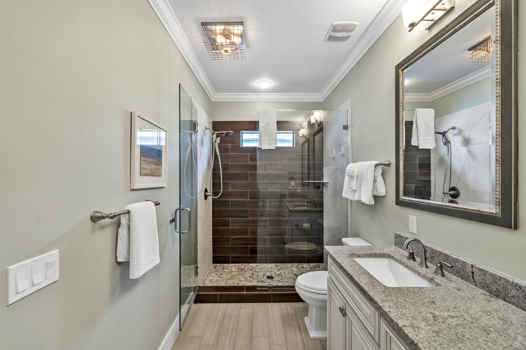71 Emma Huggins Lane Santa Rosa Beach, FL 32459 - Photo 27 of 33 a bathroom with a granite countertop sink toilet and shower