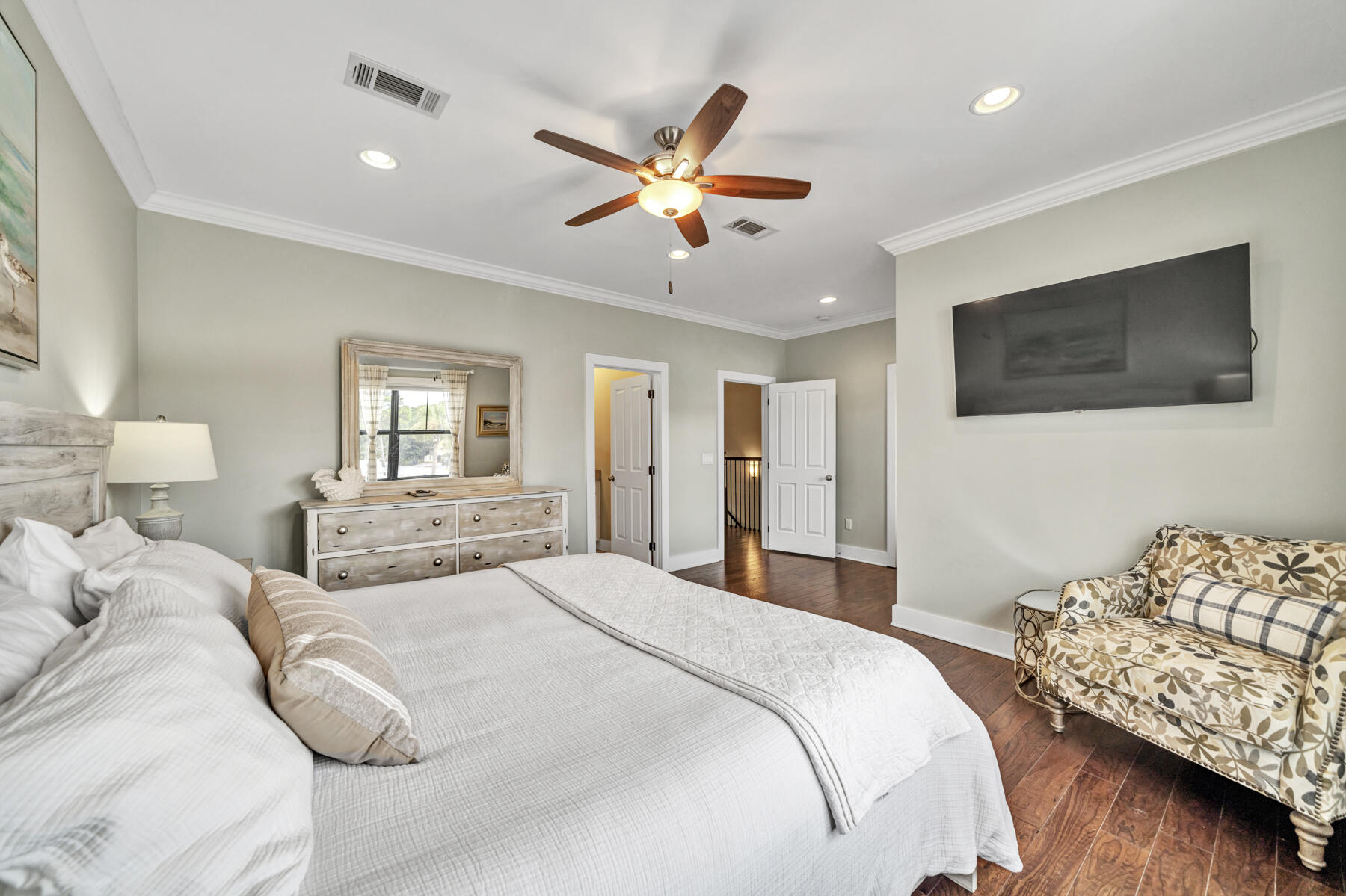 71 Emma Huggins Lane Santa Rosa Beach, FL 32459 - Photo 28 of 33 a bedroom with a large bed and a window