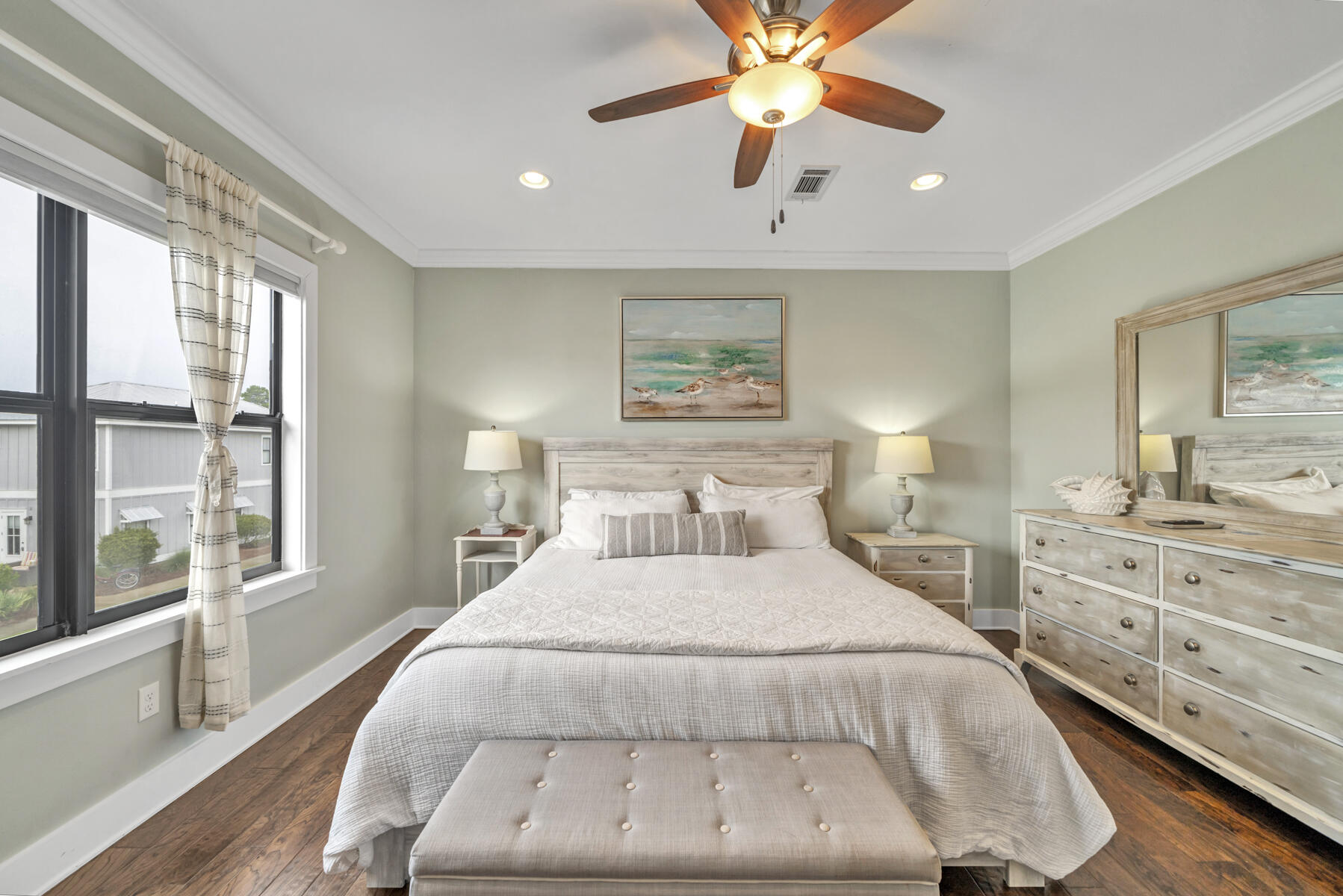 71 Emma Huggins Lane Santa Rosa Beach, FL 32459 - Photo 29 of 33 a bedroom with a large bed and a chandelier fan