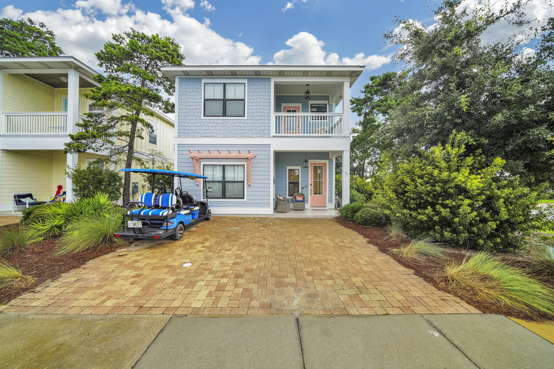 71 Emma Huggins Lane Santa Rosa Beach, FL 32459 - Photo 7 of 33 a view of a house with sitting area and garden