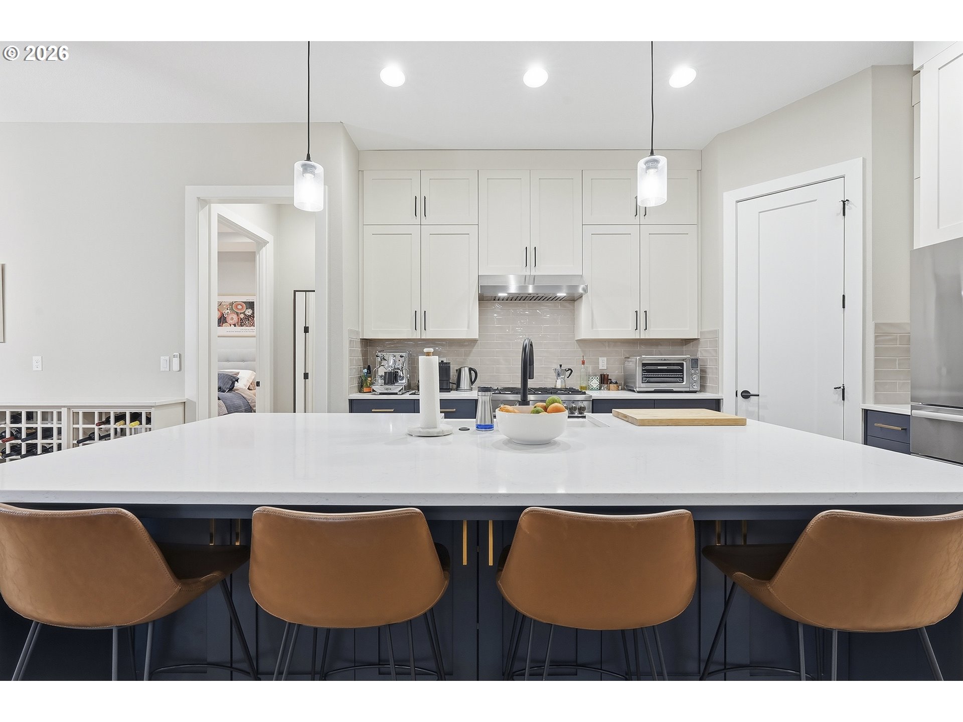 7446 Southwest 80th Terrace Portland, OR 97223 - Photo 17 of 48 a kitchen with a table chairs sink and cabinets