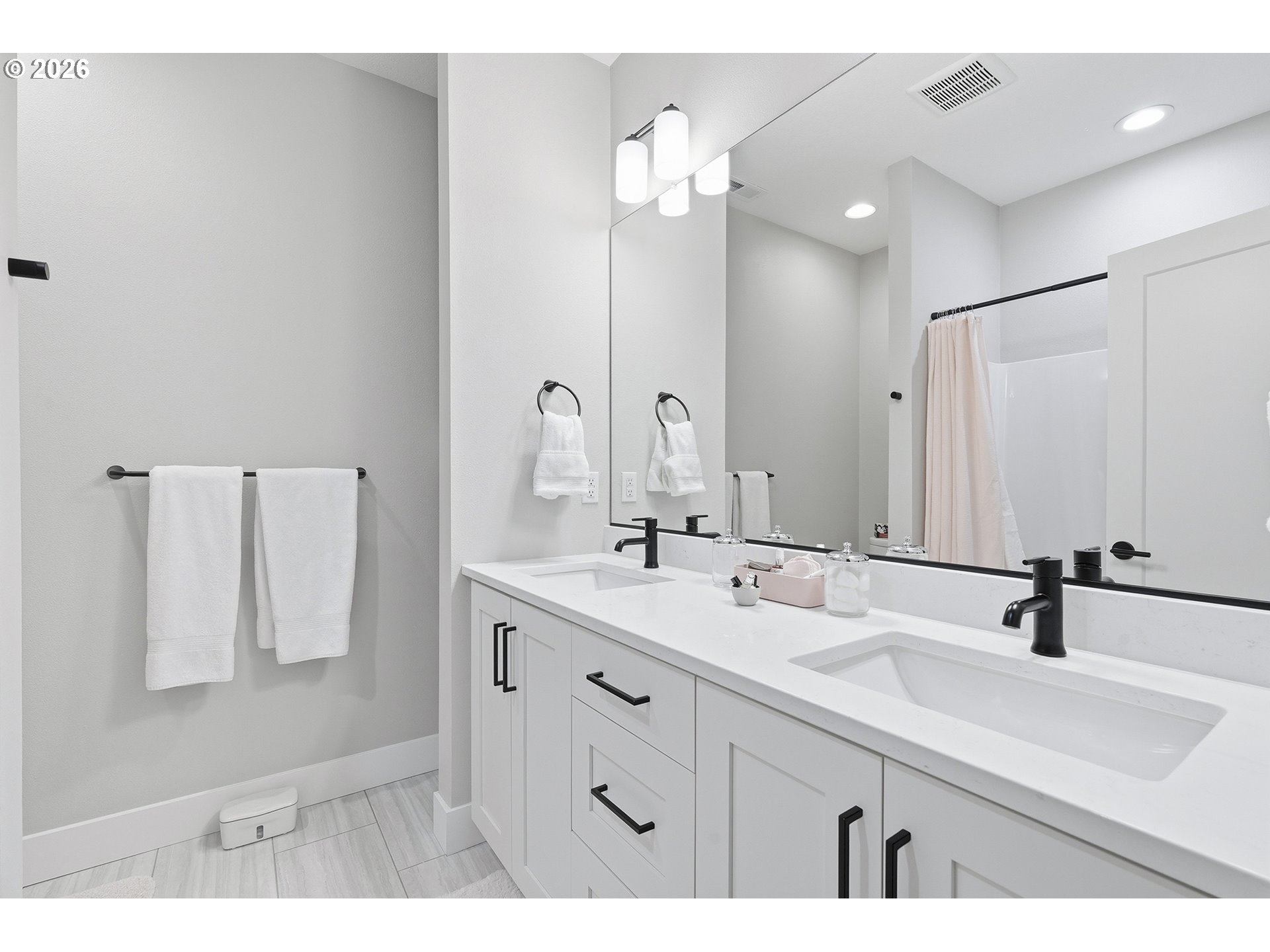 7446 Southwest 80th Terrace Portland, OR 97223 - Photo 37 of 48 a bathroom with a sink double vanity and a mirror