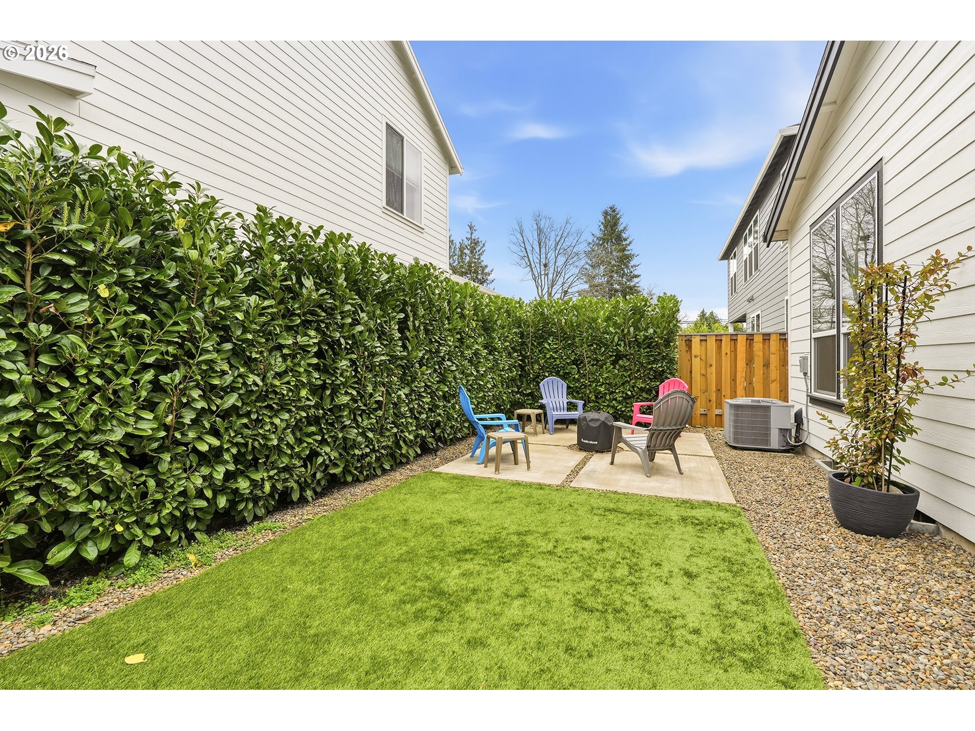 7446 Southwest 80th Terrace Portland, OR 97223 - Photo 47 of 48 a view of a backyard with sitting area and garden