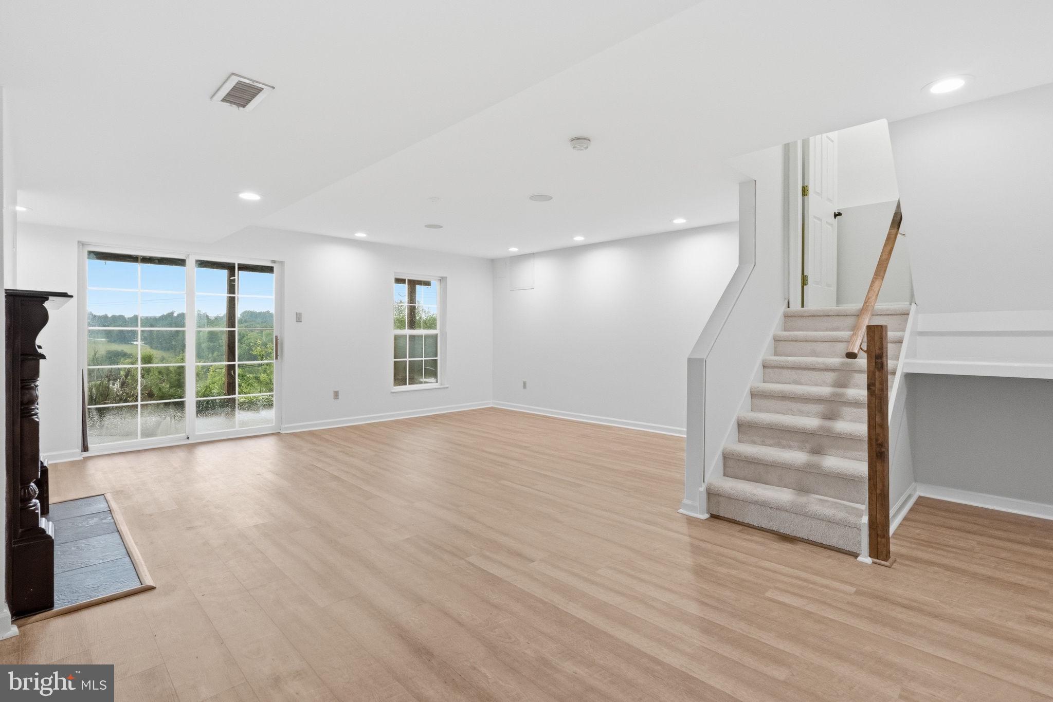 1400 Harbour Ridge Lane Downingtown, PA 19335 - Photo 28 of 36 Lower level with slider to patio