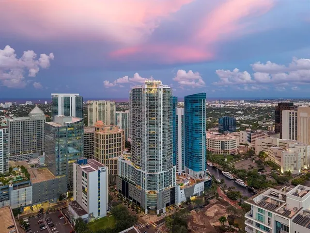 a view of a city with tall buildings