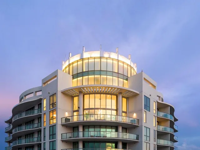 a view of a city with tall buildings