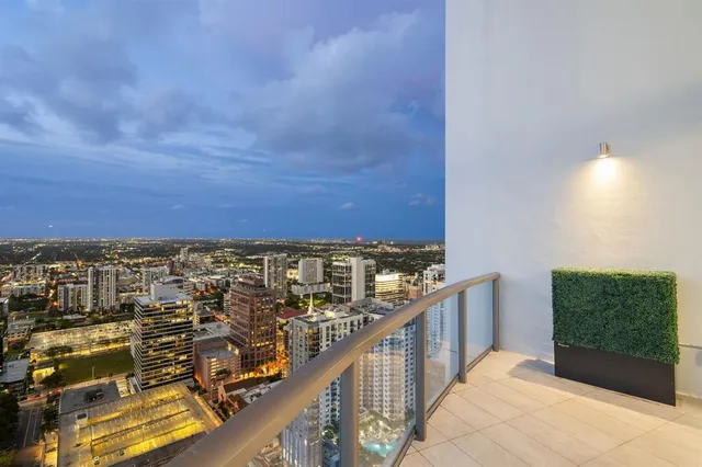 a workspace with furniture and bathroom