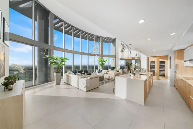 a view of a living room and dining room