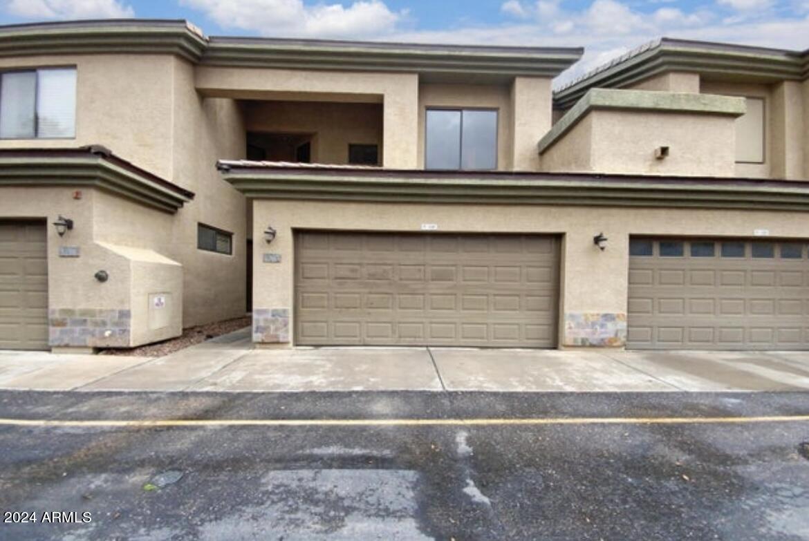 705 West Queen Creek Road, Unit 1207 Chandler, AZ 85248 - Photo 5 of 21 a house with a outdoor space