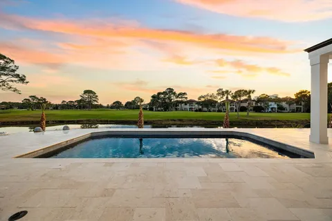 a lake view with sitting space and garden view