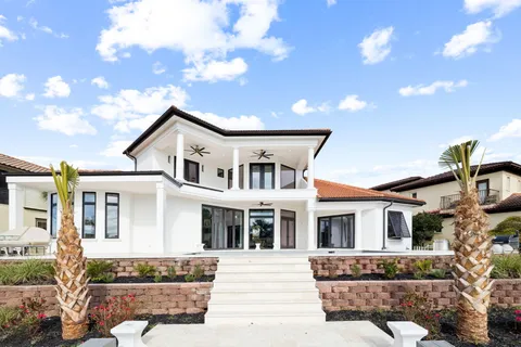 a view of a swimming pool and a porch