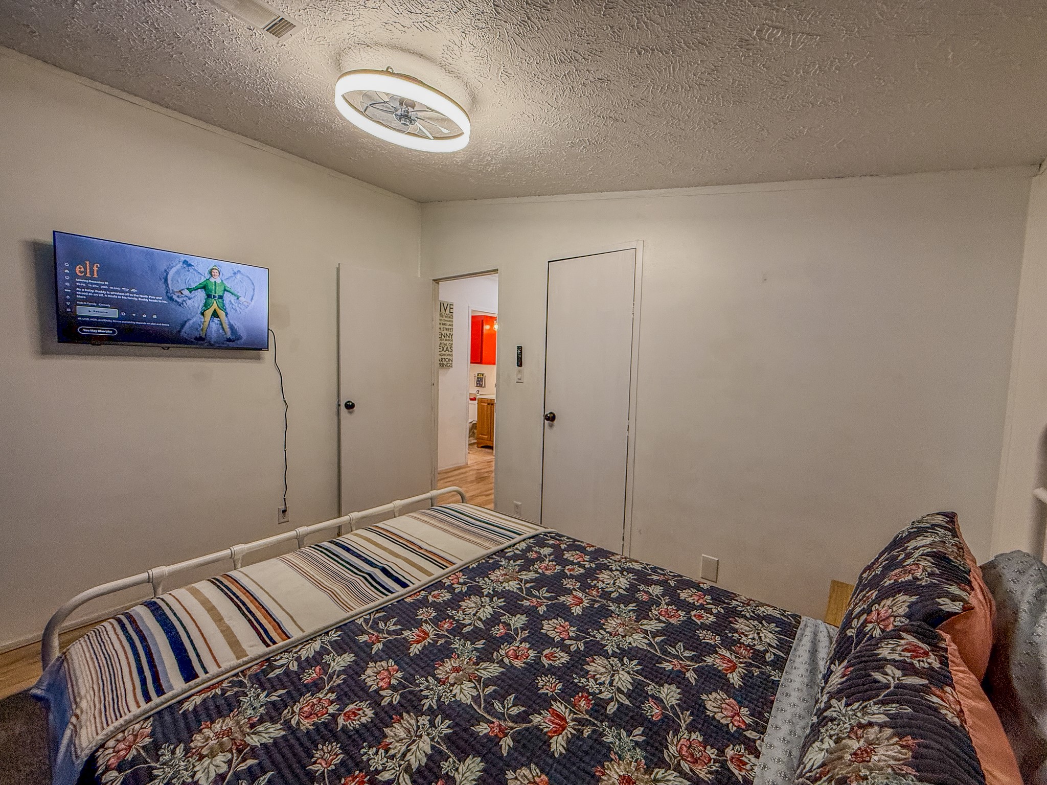 2015 Holly Street Austin, TX 78702 - Photo 13 of 24 Well-lit sleeping quarters with a ceiling fan for comfort.