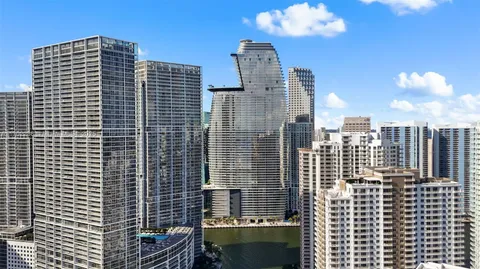 a view of a city with tall buildings
