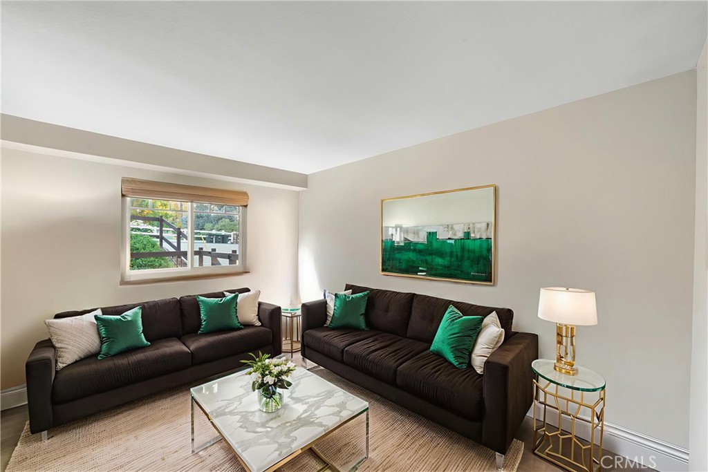 40337 Carmelita Circle Temecula, CA 92591 - Photo 15 of 65 a living room with furniture a rug and a window