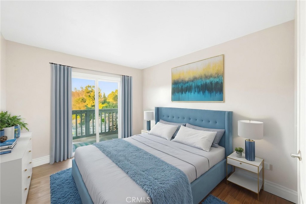 40337 Carmelita Circle Temecula, CA 92591 - Photo 19 of 65 a bedroom with a bed and a painting on the wall