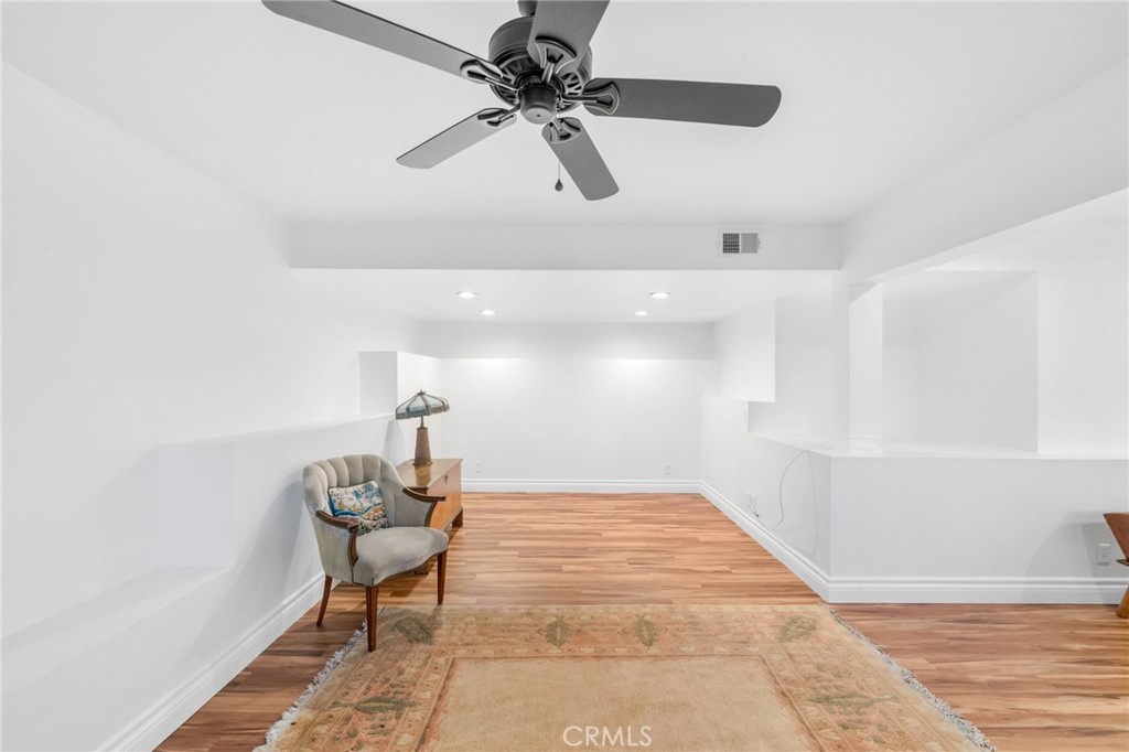 40337 Carmelita Circle Temecula, CA 92591 - Photo 40 of 65 a room with a window and a ceiling fan